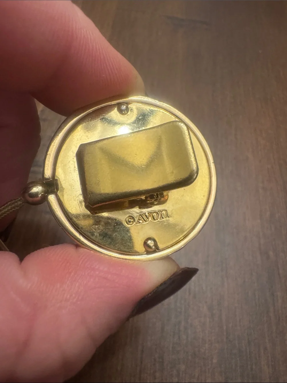 Vintage Avon Gold and White Shielded Badge Reel-retractable gold pull never used